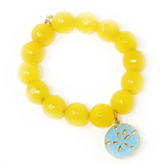 Faceted Canary Island Agate with turquoise sand dollar